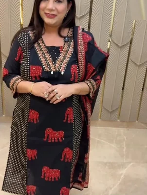 Black suit set with a red elephant block print and matching dupatta