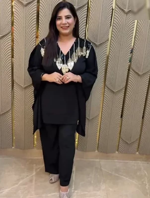 Black kaftan set with gold embroidery at the neckline