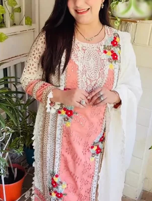 Pink embroidered suit set with an ivory dupatta